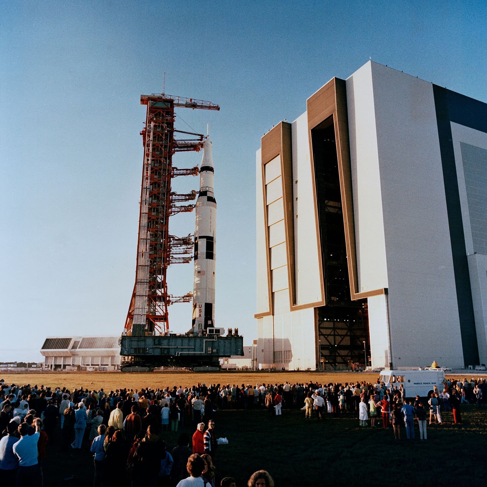 Apollo-era launch spectators crowded along the Titusville waterfront to watch a Saturn V depart from Pad 39A.
