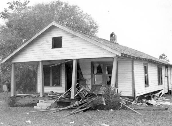 Aftermath of the bombing at the Moore home, December 1951.