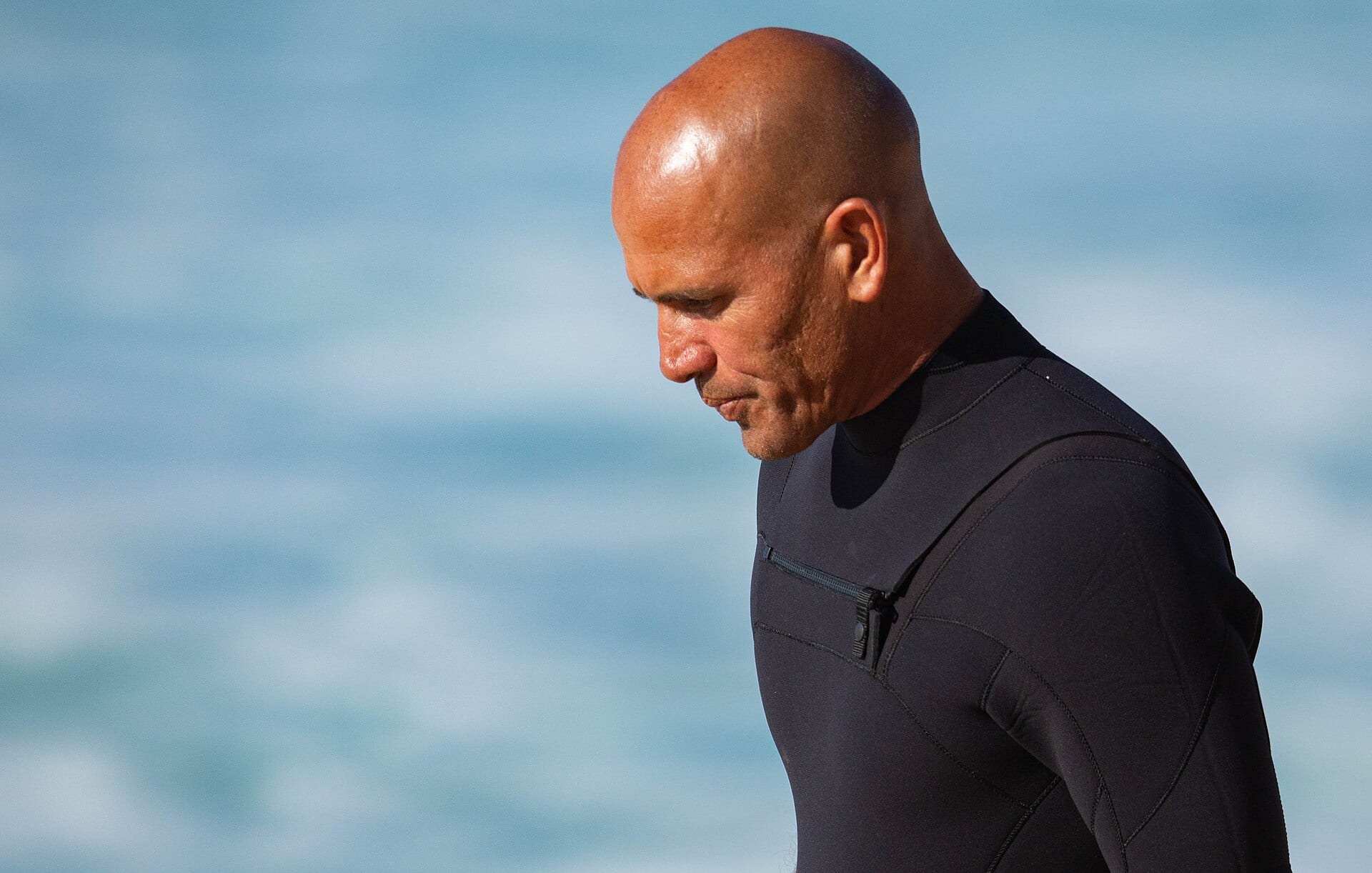 Kelly Slater surfing at the Banzai Pipeline.